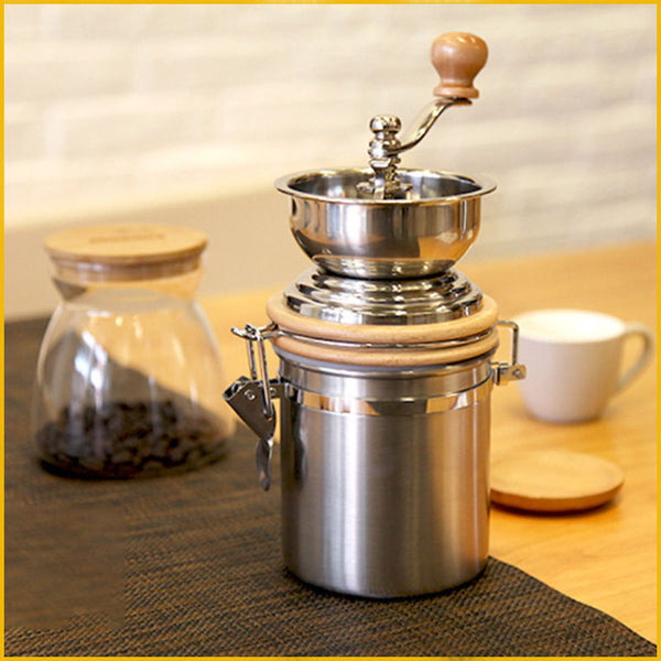 Manuelle Kaffeemuhle aus Edelstahl mit Kurbel mit Holzgriff und 150g Kaffeepulverkapazität